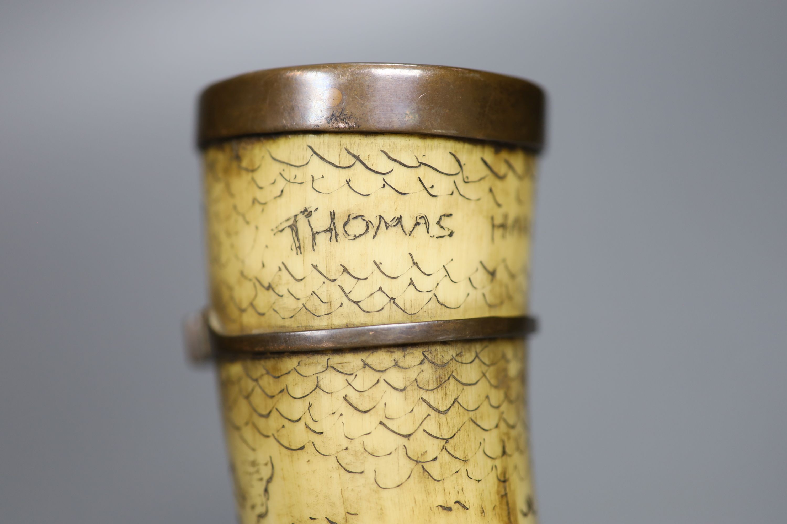 A scrimshaw horn beaker, bearing date 1837, 28cm